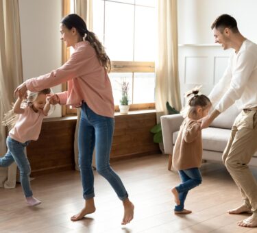 parents dancing with children